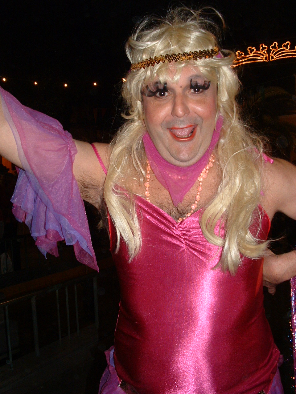 Man dress in pink flapper costume, and blonde wig, Ambassador's Parade, Santa Cruz de La Palma, 2006