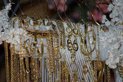 Detail of a cross decorated with jewellry for Fiesta de La Cruz, Breña Baja